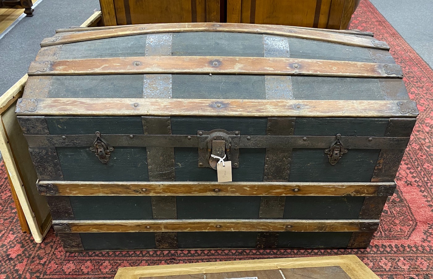 An early 20th century dome top travelling trunk, width 92cm, height 56cm